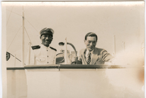 Two men on board ship (ddr-densho-426-1552)