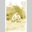 Soldier sitting (ddr-densho-22-196)