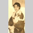 Woman wearing leis (ddr-njpa-4-2443)