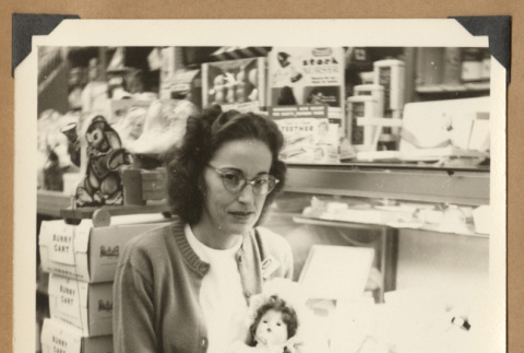 Woman holding a doll (ddr-densho-542-120)