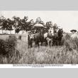 Group in field with horse drawn farming equipment (ddr-ajah-6-791)