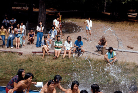 Campers having a water fight in the lake (ddr-densho-336-400)