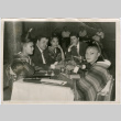 Three women and two men seated in restaurant (ddr-densho-426-818)