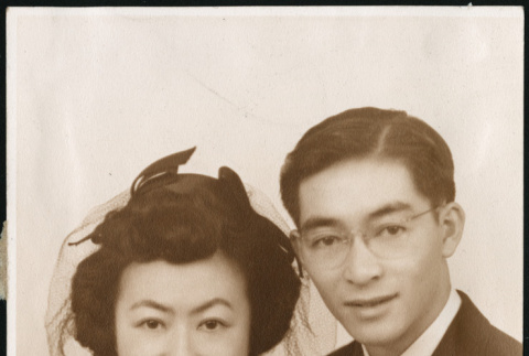 Couple wearing corsages (ddr-densho-395-50)