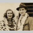 A couple wearing leis on a ship (ddr-njpa-1-411)
