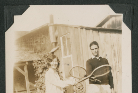 man and woman with tennis rackets (ddr-densho-378-486)