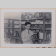 Tom reading (ddr-densho-462-263)