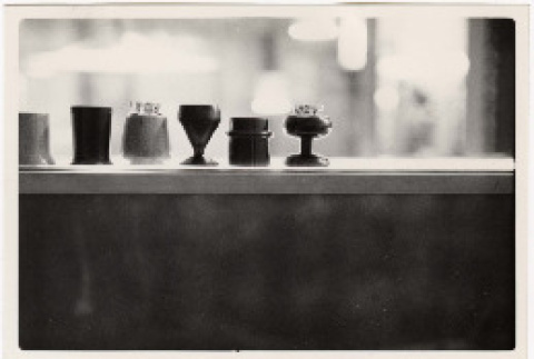 Photo of tabletop lighters on display (ddr-densho-424-48)