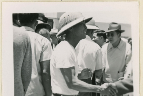 Man shaking hands at Canal (ddr-densho-37-1436)