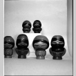 Small carved figures on display (ddr-densho-426-2210)