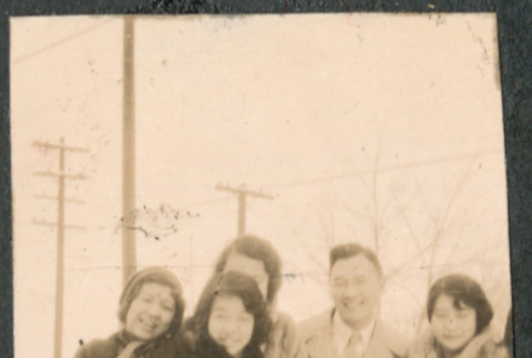 Group of five people standing in snow (ddr-densho-523-33)