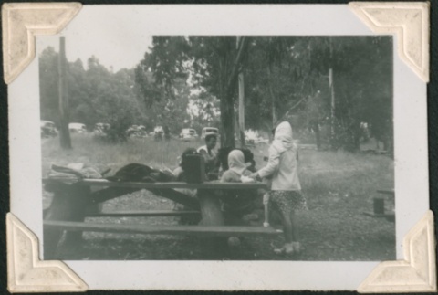People at picnic table (ddr-densho-321-223)
