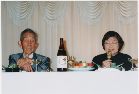 Tomoye Takahashi seated at banquet table (ddr-densho-422-572)