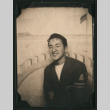 Walter Matsuoka poses in a letterman jacket (ddr-densho-390-67)