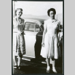 Photograph of women standing in front of a car (ddr-csujad-47-323)