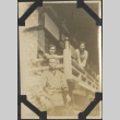 A group sitting on a deck (ddr-densho-432-135)