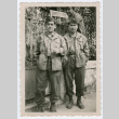 Soldiers in front of fence (ddr-densho-368-141)