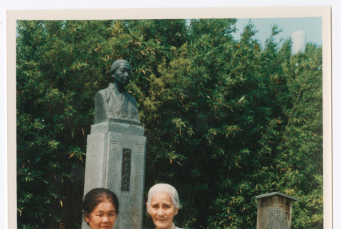Mitsuye Yabe and Friend Next to Bust (ddr-ohs-1-177)