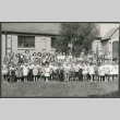 Large group photo of children and adults (ddr-densho-523-249)