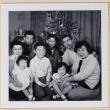 Shiomi family with other family by Christmas tree (ddr-densho-522-526)