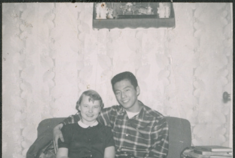 Young couple on couch (ddr-densho-523-303)