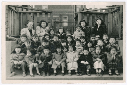 Photograph front and back (ddr-densho-540-18-mezzanine-2f0e7108f4)