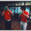 Neil Tsubota and Roger Morimoto drinking 7 Up during a camp workshop (ddr-densho-336-1300)