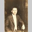 Man seated in a chair (ddr-njpa-4-2035)