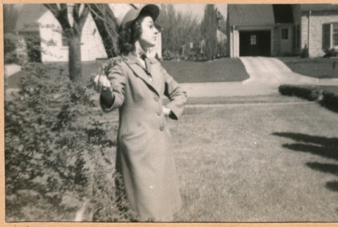 Woman in trenchcoat (ddr-densho-468-312)