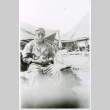 Soldier and puppy (ddr-densho-1007-870)