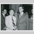 Tak Hamano shaking hands with Jerry Brown (ddr-densho-499-29)