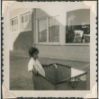 Young girl in a mail bin (ddr-densho-321-1056)