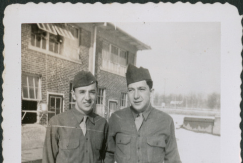 Two men outside building (ddr-densho-434-469)