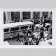 Black and White photo of baseball team boarding bus (ddr-densho-426-12)