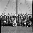Group portrait of passengers and crew on board ship (ddr-densho-426-290)