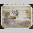Two men visiting a grave (ddr-densho-300-565)
