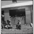Young Japanese Americans waiting for new arrivals (ddr-densho-151-255)
