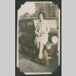 woman next to car (ddr-densho-378-542)