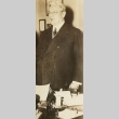 Hiram Johnson standing in front of a desk (ddr-njpa-1-521)