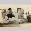 Gandhi seated, holding a suitcase (ddr-njpa-1-453)