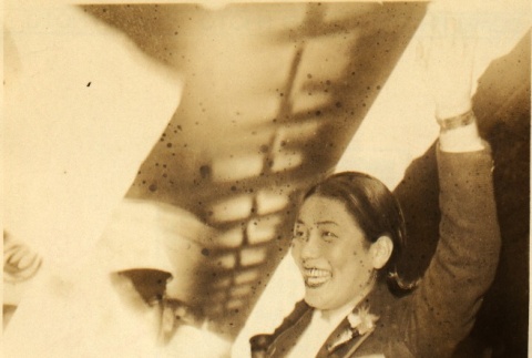 Hideko Maehata waving at Tokyo Station (ddr-njpa-4-696)