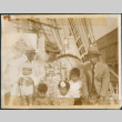 Family photo on the deck of a ship (ddr-densho-483-550)