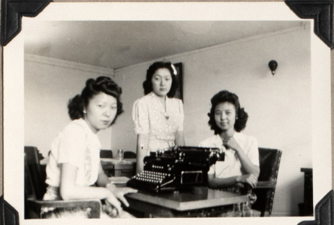 Three women with typewriter (ddr-densho-587-15)