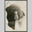 woman on log (ddr-densho-378-635)