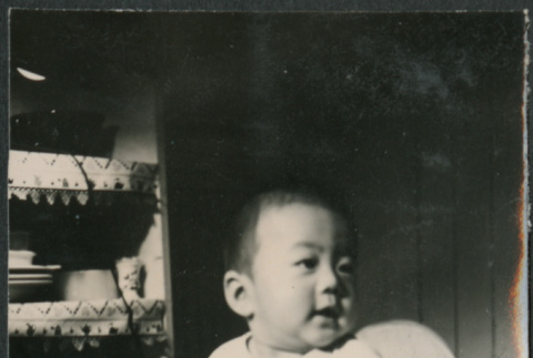 Baby in highchair (ddr-densho-523-64)