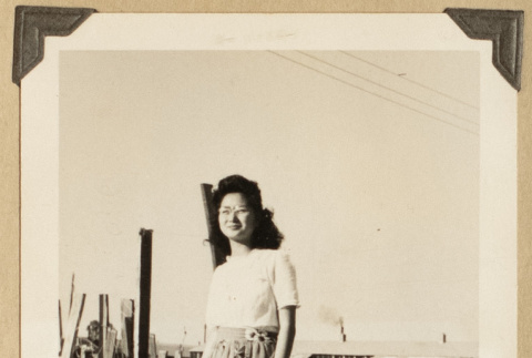 Chiyoko Dote by a garden (ddr-densho-542-516)