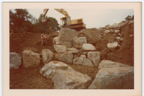 Rock waterfall and pond under construction (ddr-densho-377-2211)