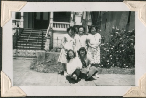 Five young women by rosebush (ddr-densho-321-219)