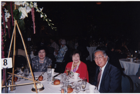 Martha Suzuki, Tomoye and Henri Takahashi seated at a table (ddr-densho-426-453)