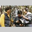 Marice Tatsuno and Paul Osaki presenting Eileen Yemoto with a Bible (ddr-densho-336-1757)